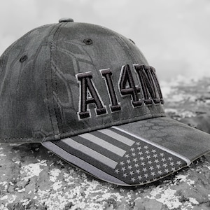 Ham radio Call sign hat for the amateur radio or GMRS operator. Black Kryptek pattern custom text hat.