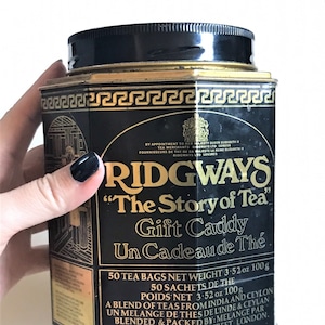 Art-Deco-Stil Ridgeways ""The Story of Tea"" Dose, schwarz-goldenes Dekor, Vintage-Werbung, England."