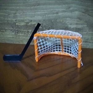 Mini tabletop hockey net & stick