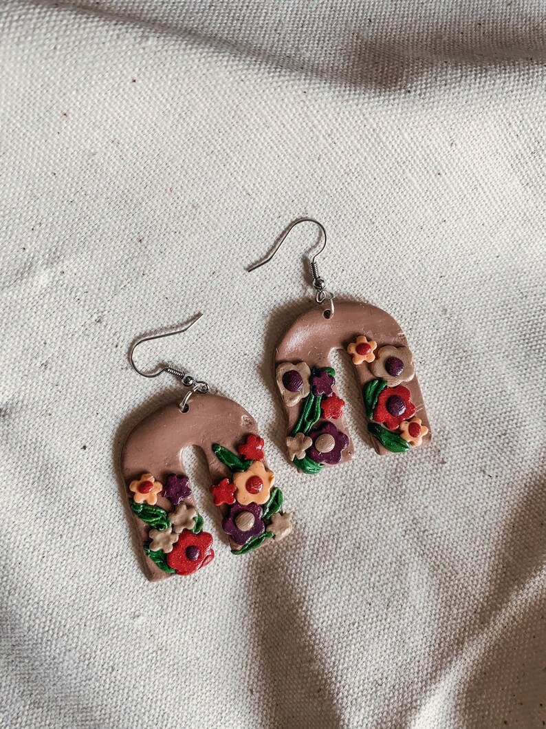 Floral arch clay earrings