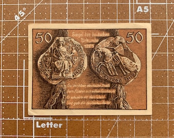 Alemania 50 Pfennig Notgeld. Década de 1920, época entre la Primera y la Segunda Guerra Mundial. Moneda de emergencia alemana. Primera y Segunda Guerra Mundial.