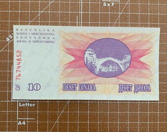 Rzadki banknot 10 Dinara Bośni i Hercegowiny z 1992 r. - zabytkowa jugosłowiańska waluta, historyczny przedmiot kolekcjonerski z zachwycającym projektem mostu