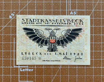 Niemcy 50 Pfennig Notgeld. 1921, epoka między I a II wojną światową Niemiecka waluta awaryjna I wojna światowa, II wojna światowa. Lubeka. Dwugłowy orzeł. Stary budynek.