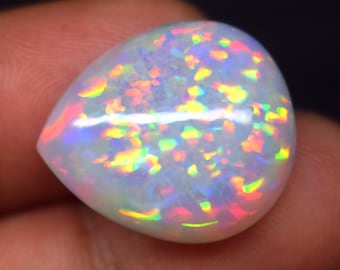 Ethiopian Opal Big Dotted Fire Gemstone: 13.1 CT Pear Cabochon (20.6x17.8x7.5 mm)