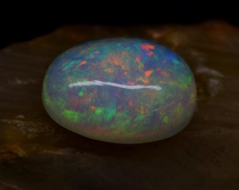 Natural Ethiopian Opal 8.50 Carat Loose Gemstone, Oval Shape Opal Cabochon Gemstone October Birthstone, size 17x12.4x7.9 MM