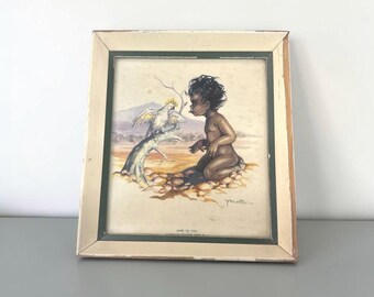 May include: Framed vintage print featuring a child interacting with a cockatoo. The artwork has a cream-colored frame with a green inner border. The print depicts a child and bird in a desert landscape. The text "LAKE TO YOU" is visible at the bottom.