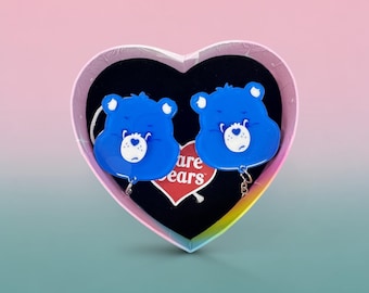 Clips para cárdigan de Oso Gruñón en caja