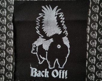Back off! Skunk defense punk cloth patch