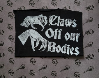 Claws off our bodies punk cloth patch