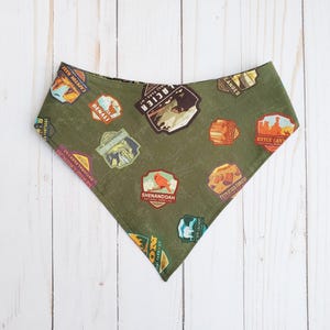 National Parks dog bandana • Green park badges reversible pet scarf • Over the collar or snap on dog bandana • Hiking buddy bark ranger