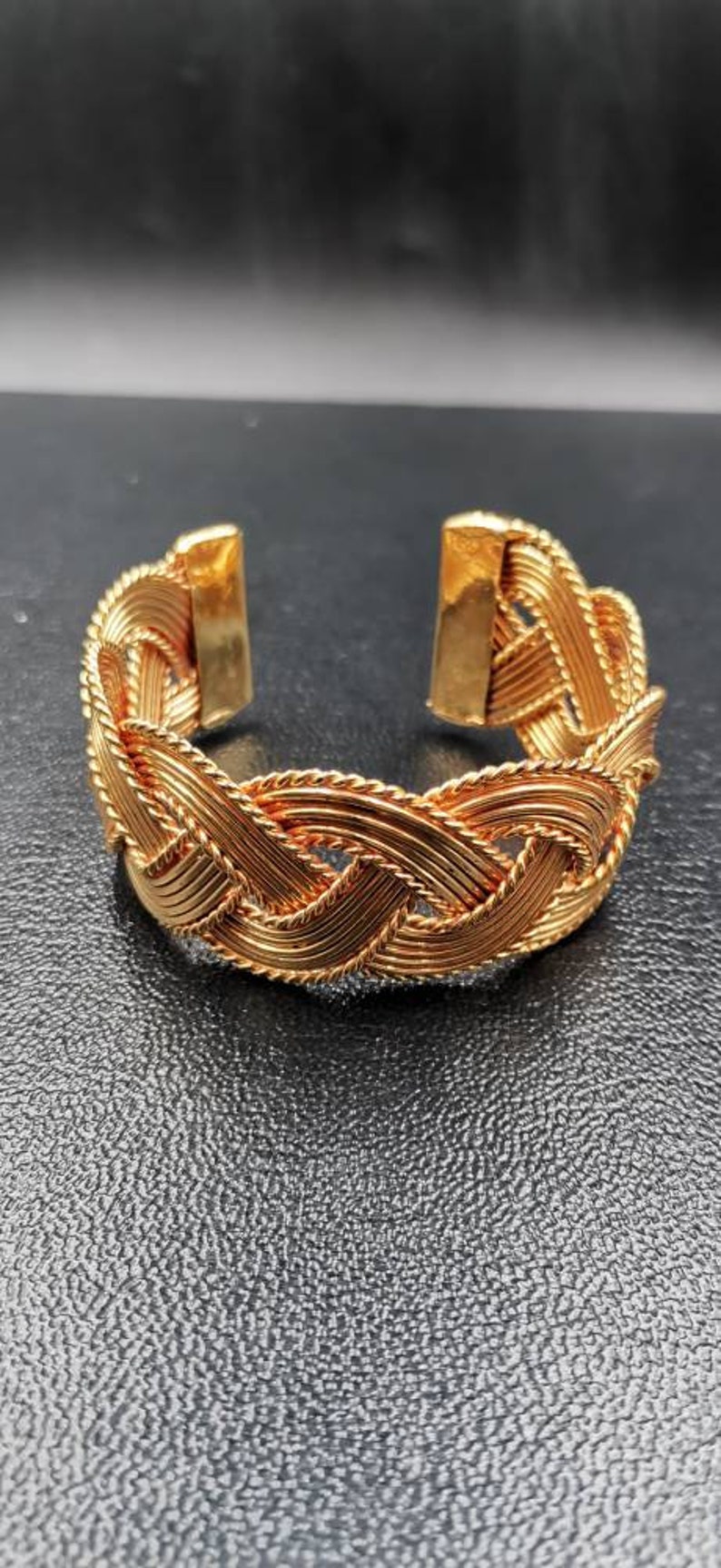 Unique looking gold plated bangle