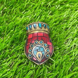 Wonderful vintage handmade Tibetan pendant with coral and turquoise stones and gold plated accents
