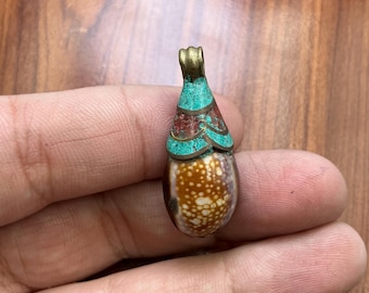 old vintage shell pendant with gold plated accents