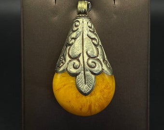 Wonderful handmade Nepalese silver plated amber pendant