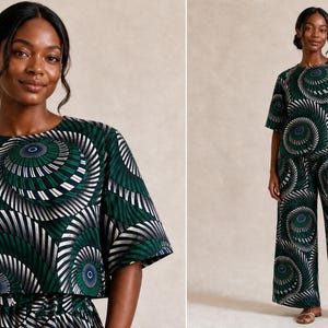 May include: A two-piece set consisting of a short-sleeved top and wide-leg trousers. The garments feature a dark green, black, and white graphic print with repeating spiral patterns that create a dynamic, circular visual effect across the fabric.