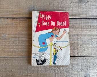 Pippi sube a bordo // por Astrid Lindgren // 4.ª edición, 1966 // Scholastic Book