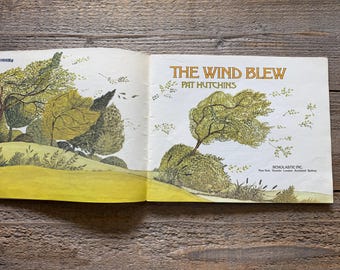 The Wind Blew // by Pat Hutchins // First Scholastic Printing 1993