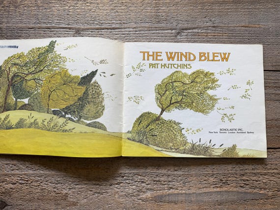 The Wind Blew // by Pat Hutchins // First Scholastic Printing 1993