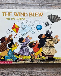 The Wind Blew // by Pat Hutchins // First Scholastic Printing 1993