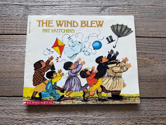 The Wind Blew // by Pat Hutchins // First Scholastic Printing 1993