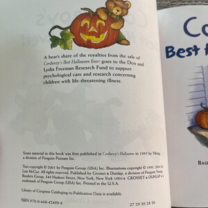May include: A book cover with a picture of a teddy bear holding a jack-o-lantern. The book title is "Corduroy's Best Halloween Ever!" and the text says that a portion of the royalties from the sale of the book goes to the Don and Lydia Freeman Research Fund to support psychological care and research concerning children with life-threatening illness.