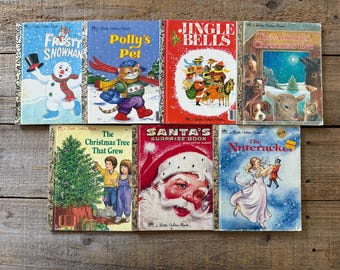 May include: A selection of vintage children's books with vibrant covers. Titles include "Frosty the Snowman," "Polly's Pet," "Jingle Bells," "The Animals' Christmas Eve," "The Christmas Tree That Grew," "Santa's Surprise Book," and "The Nutcracker."
