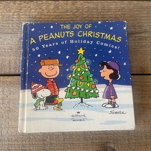 The Joy of A Peanuts Christmas: 50 jaar kerststrips! // 2000 Hallmark Cards hardcover boek // Charlie Brown, Snoopy, Linus, Lucy