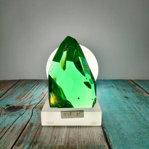 Natural polished cutting andara crystal light green 518gr with base for collection