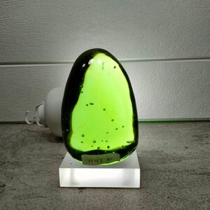 Polished natural andara crystal emerald green 1143gr with base for decoration