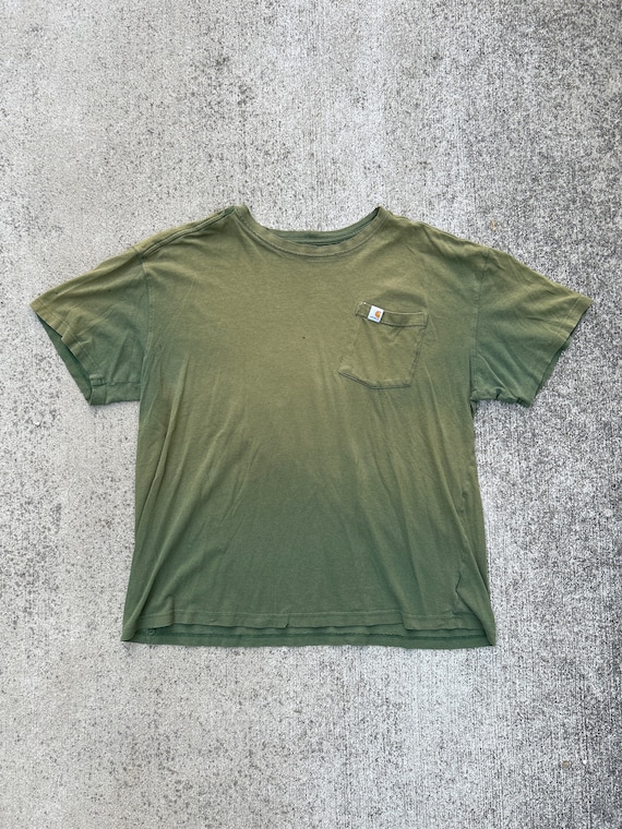 Carhartt faded distressed green T-shirt.
