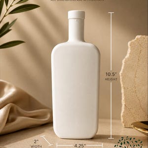 May include: A white rectangular bottle with a rounded top, 10.5 inches in height, 4.25 inches in length, and 2 inches in width. The image includes the text "SIZE CHART" and "ALL DIMENSIONS ARE APPROXIMATE".