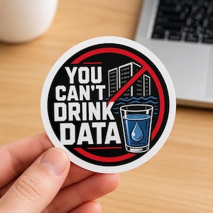 May include: A circular sticker with a black background and a red border. It features the white text YOU CAN'T DRINK DATA, a graphic of a server building, blue water waves, and a glass of water with a blue water drop inside, all crossed out.