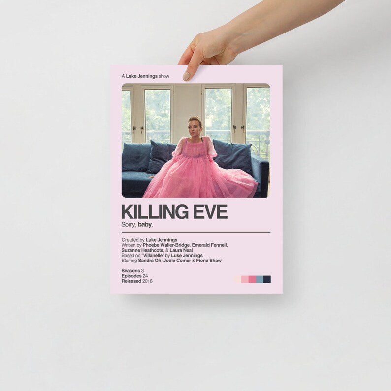 May include: A pink and white poster with the title "KILLING EVE" in black text. The poster features a woman in a pink dress sitting on a blue couch. The text "Sorry, baby." is below the title. The poster also includes information about the show, including the creators, writers, and actors.