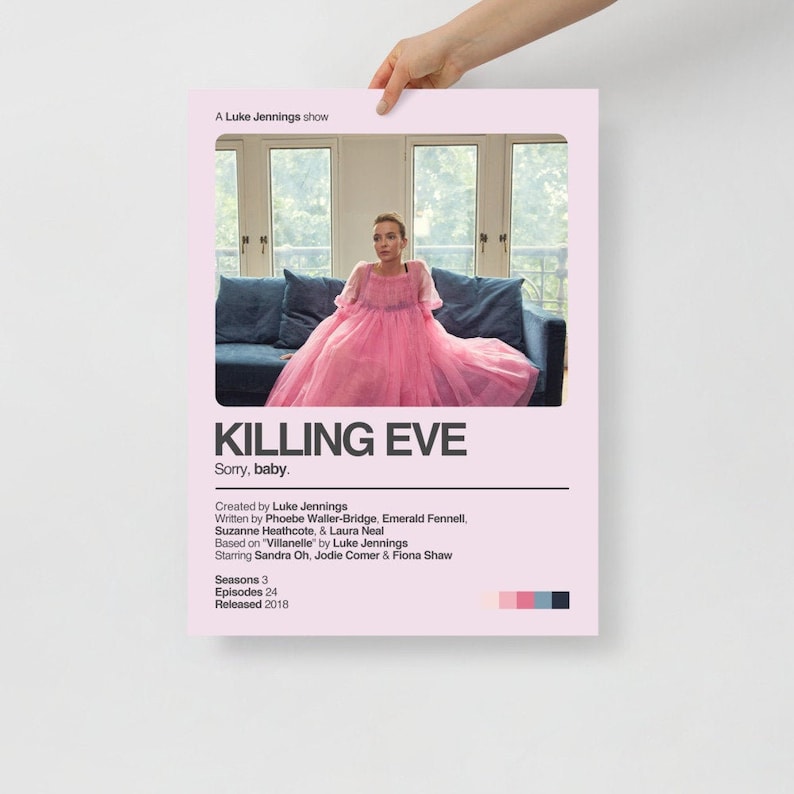 May include: A pink poster with the title "KILLING EVE" in black text. The poster features a woman in a pink dress sitting on a couch. The text "Sorry, baby." is below the title. The poster also includes information about the show, such as the creators, writers, and actors.