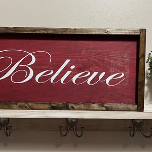 Believe wooden sign