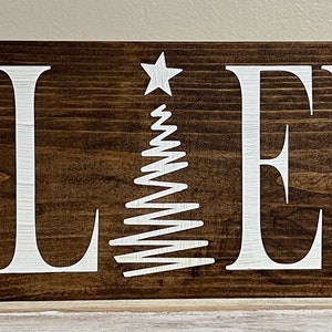 Believe wooden sign