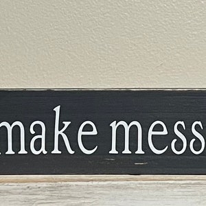 Wir machen Erinnerungen und Unordnungen in diesem Küchenholz