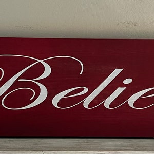 Believe wooden sign