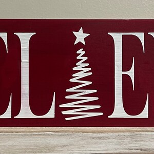 Believe wooden sign