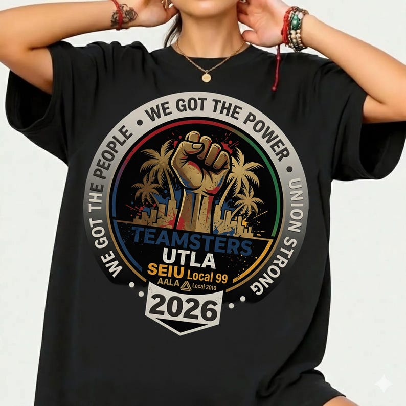 May include: Black t-shirt with a circular graphic featuring a raised fist, palm trees, and the text "WE GOT THE PEOPLE WE GOT THE POWER UNION STRONG TEAMSTERS UTLA SEIU Local 99 AALA Local 2010 2026".