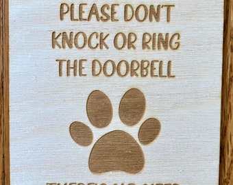 Deliveries don’t knock or ring the doorbell, there’s no need to get the dog involved hanging sign