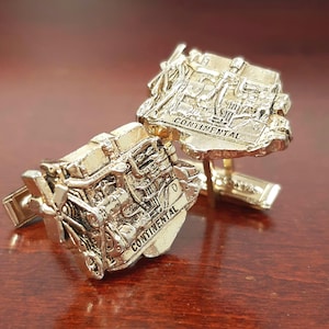 May include: A rustic wooden sign with the text "Welcome to our home" in white lettering. The sign has a distressed finish and a simple, inviting design, ideal for entryway decor.