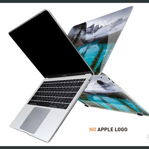 May include: A silver laptop computer with a black screen and a keyboard. The laptop has a blue and green landscape design on the back. The text "NO APPLE LOGO" is printed on the bottom of the image.