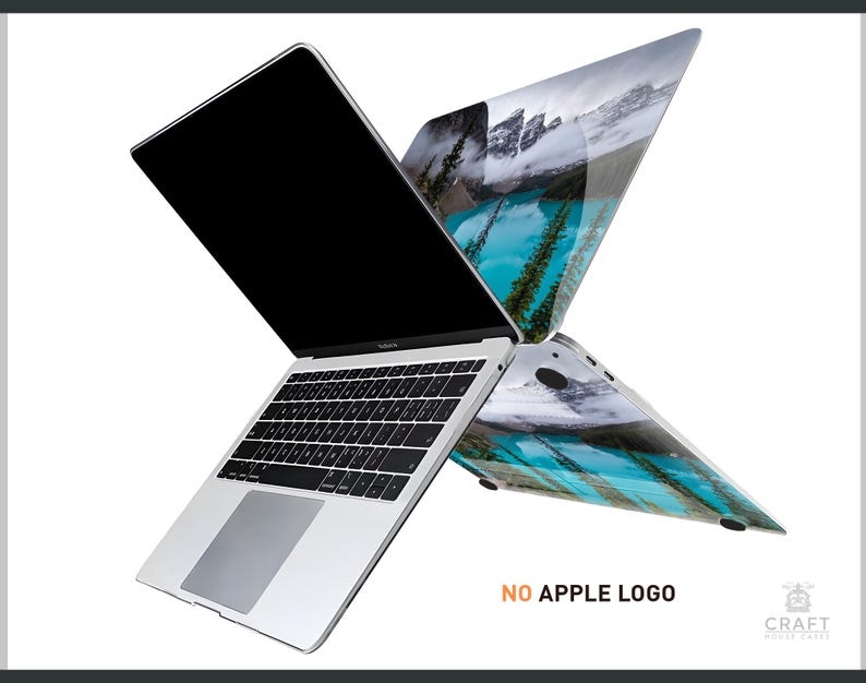May include: A silver laptop computer with a black screen and a keyboard. The laptop has a blue and green landscape design on the back. The text "NO APPLE LOGO" is printed on the bottom of the image.