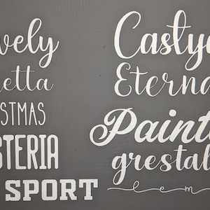 May include: A gray background with white text. The text reads "lovely", "Metta", "Christmas", "Hysteria", "Old Sport", "Castlya", "Eternal", "Painter", "grestal", and "lemon".