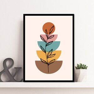 K&ouml;nnte beinhalten: Abstrakter Kunstdruck mit einer schwarzen Linienzeichnung eines Zweigs mit Bl&auml;ttern auf einem Hintergrund aus gestapelten Halbkreisen in Orange-, Rosa-, Blau-, Gelb- und Braunt&ouml;nen.