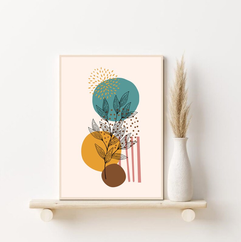 K&ouml;nnte beinhalten: Abstrakter Kunstdruck mit einem geometrischen Design in Teal, Gelb und Braun, das eine schwarze Linienzeichnung einer Pflanze mit Bl&auml;ttern zeigt. Der Druck hat ein rosa-wei&szlig; gestreiftes Muster im Hintergrund.