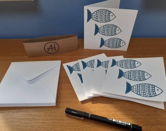 PAQUETE DE 5 TARJETAS Diseño de pez azul impreso en bloque.