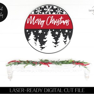 May include: Black and red round sign with white snowflakes, trees, and the text "Merry Christmas".