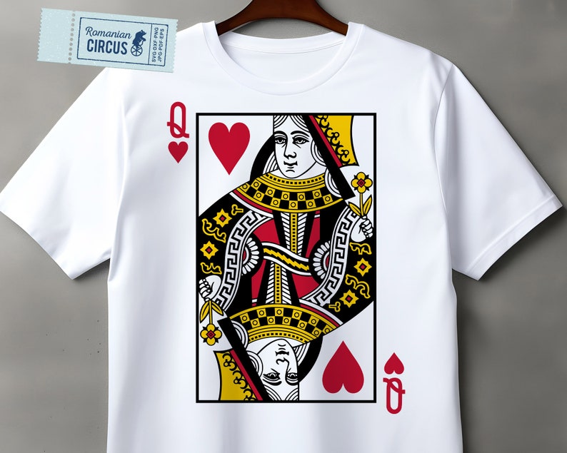 May include: White t-shirt with a graphic of the Queen of Hearts playing card. The card is red and black with a yellow and gold design. The Queen is wearing a crown and holding a flower.